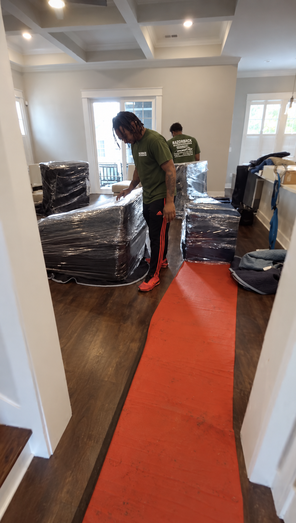 Razorback movers protecting furniture during a home move